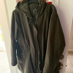 Torrid Olive a green Winter Jacket with faux leather details.